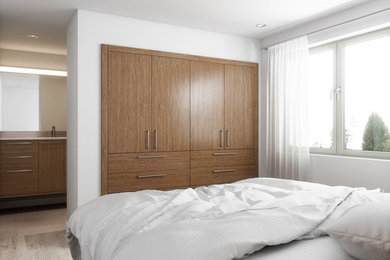 Ejemplo de dormitorio minimalista de tamaño medio con suelo de madera clara y suelo gris