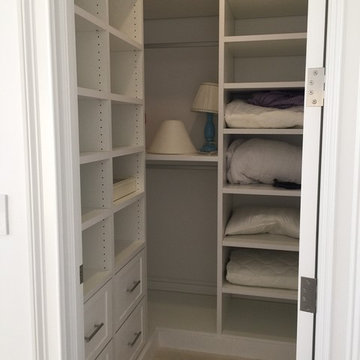 Inset Her Master Closet in White Melamine with Shaker Fronts