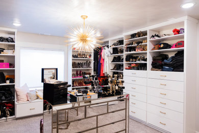 Example of a large arts and crafts women's carpeted and gray floor walk-in closet design in Salt Lake City with open cabinets and white cabinets