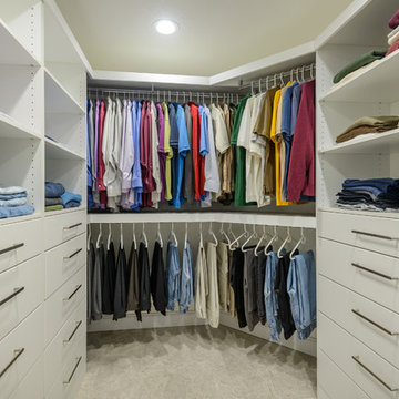 Large Walk In Closet with Hanger Space and Cabinet Storage