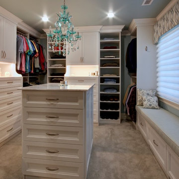 Large White Textured Walk-In Closet with Island