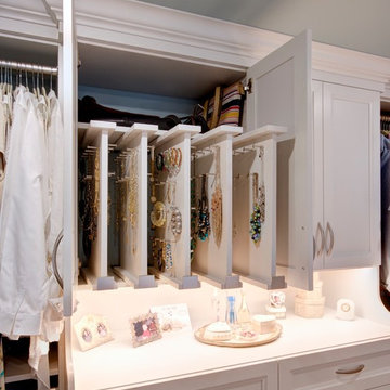 Large White Textured Walk-In Closet with Island