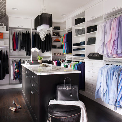 Dressing room - transitional gender-neutral dark wood floor dressing room idea in Philadelphia with open cabinets and white cabinets