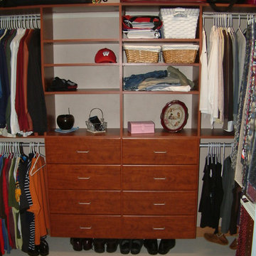 Master closet in Natural Cherry with 8 24" large drawers