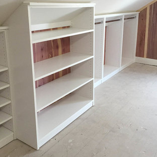 Inspiration for a large transitional gender-neutral carpeted walk-in closet remodel in Cincinnati with flat-panel cabinets and white cabinets