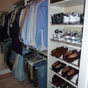 Master Closet with shoe tower and mens' hanging