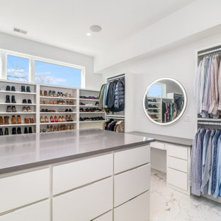 Built-in closet - large contemporary gender-neutral marble floor and gray floor built-in closet idea in Chicago with flat-panel cabinets and white cabinets