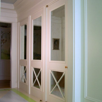 Mirrored Doors with X detail and hand carving