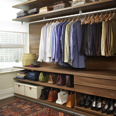 Example of a trendy walk-in closet design in Toronto
