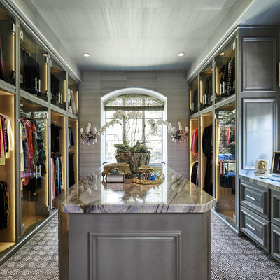 Walk-in closet - large transitional gender-neutral carpeted walk-in closet idea in Dallas with raised-panel cabinets and gray cabinets