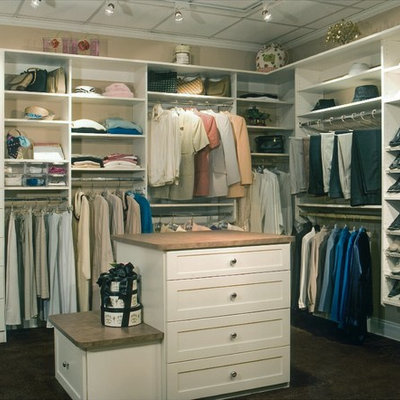Mid-sized elegant gender-neutral carpeted and black floor dressing room photo in Other with shaker cabinets and white cabinets