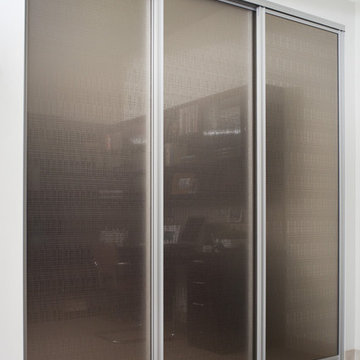 Reach In Closet With Triple Track Sliding Doors