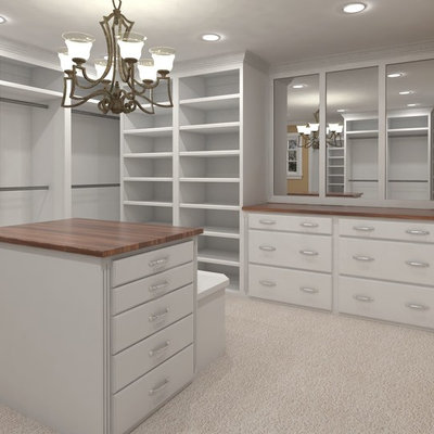 Example of a mid-sized classic women's carpeted and beige floor walk-in closet design in Tampa with open cabinets and white cabinets