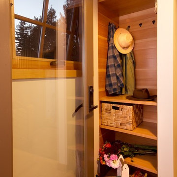 Side entry with custom fir closet.