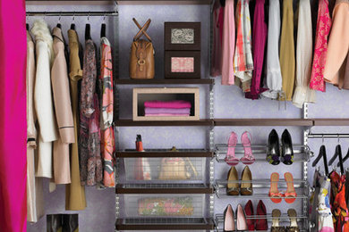 Inspiration for a large timeless women's dressing room remodel in Phoenix with open cabinets