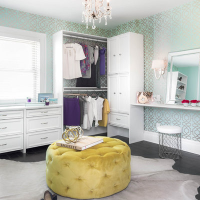 Example of a large transitional women's dark wood floor dressing room design in Toronto with white cabinets and recessed-panel cabinets