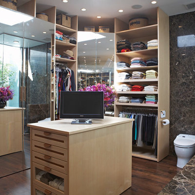Example of a trendy dressing room design in Los Angeles with open cabinets and light wood cabinets