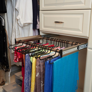 Traditional highly-functional custom women's walk-in closet