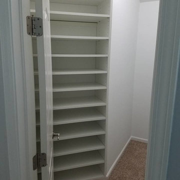 Traditional White Bedroom Closet in Jacksonville, FL