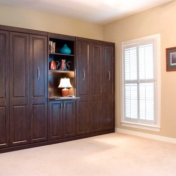 Twin panel beds with a small desk area