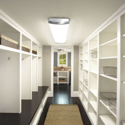 Walk-in closet - contemporary dark wood floor walk-in closet idea in Minneapolis with open cabinets and white cabinets