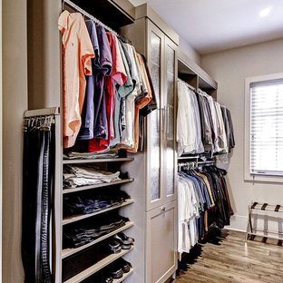 Transitional gender-neutral walk-in closet photo in Philadelphia with shaker cabinets