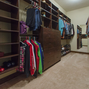 Walk-in closet with built in shelves for organization