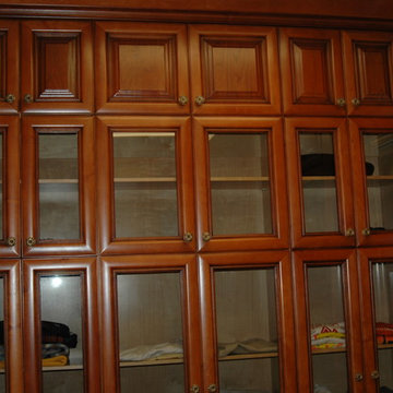 Walk-In Closet with Glass Cabinets