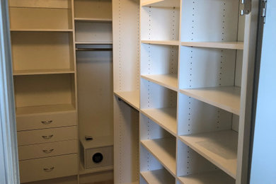 Walk-in Closet with hanging and floor standing system