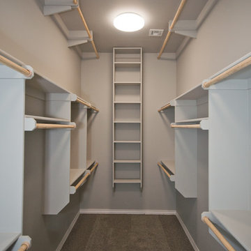 Walk-In Closet with Rods Near Ceiling