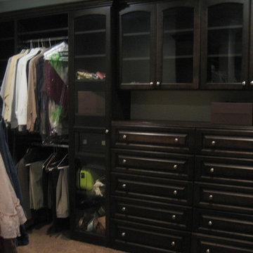 Walk-in Master Closet Chocolate Stained Wood Exteriors and Chocolate Melamine