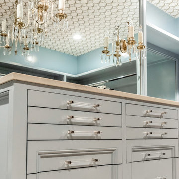 Wallpapered Ceiling and Custom Painted Cabinet Built-ins in a Master Closet
