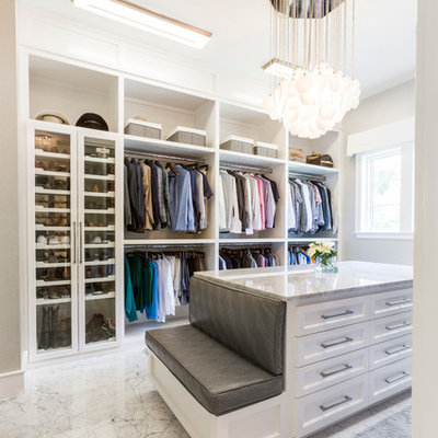 Inspiration for a transitional gender-neutral gray floor dressing room remodel in Houston with shaker cabinets and white cabinets