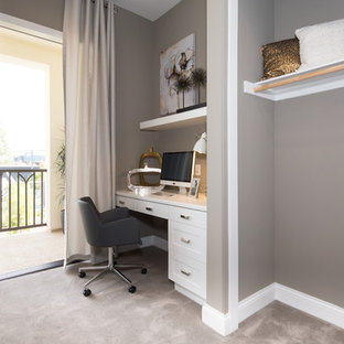Inspiration for a gender-neutral carpeted reach-in closet remodel in Orange County