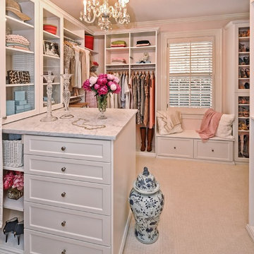 White Walk In Closet with Bench & Glass Cabinets