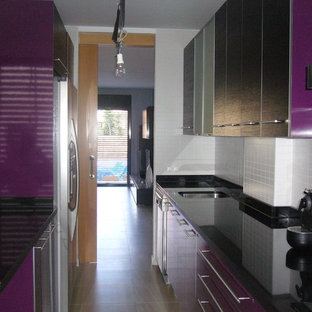 Small transitional galley separate kitchen in Other with an undermount sink, glass-front cabinets, ceramic floors and no island.