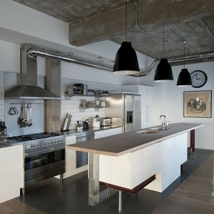 Design ideas for a large industrial single-wall open plan kitchen in Madrid with a double-bowl sink and with island.