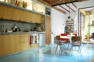 Large urban single-wall kitchen/diner in Barcelona with flat-panel cabinets, brown cabinets, concrete worktops, grey splashback, cement tile splashback, stainless steel appliances, concrete flooring and no island.