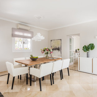 Foto de comedor actual, cerrado, sin chimenea, con paredes blancas y suelo beige