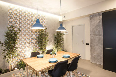 Diseño de comedor de cocina urbano de tamaño medio con paredes grises, suelo gris y suelo de cemento