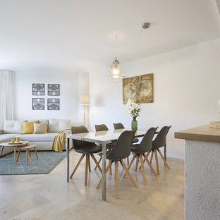 Foto de comedor actual, abierto, con paredes blancas y suelo beige