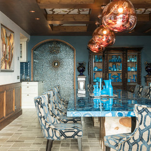 Foto de comedor ecléctico, cerrado, con paredes azules y suelo beige