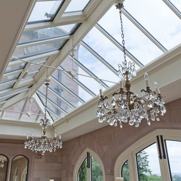 This orangery creates a classy dining room with spectacular views