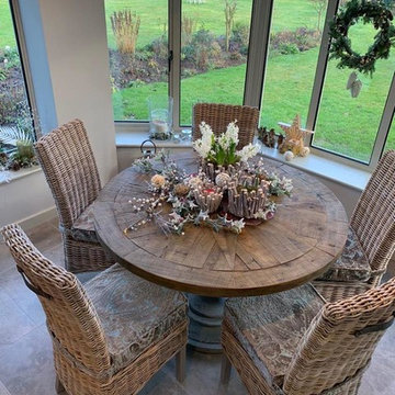 Bespoke Round Dining Table & Grey Wash Rattan Chairs with matching seat covers