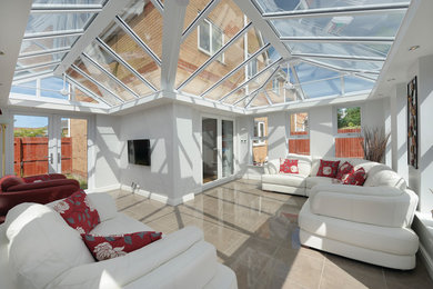 Photo of a contemporary conservatory in Berkshire.