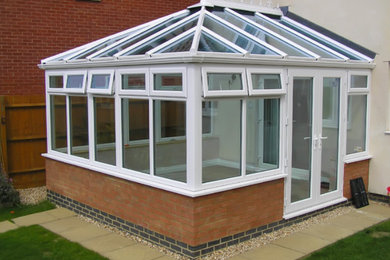 Photo of a contemporary conservatory in Other.