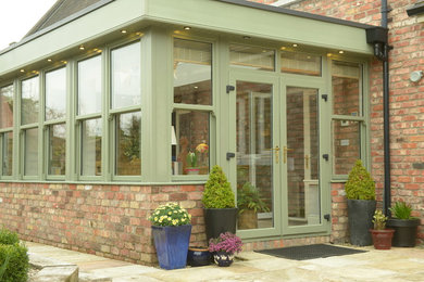 This is an example of a large contemporary conservatory in Other with ceramic flooring, a standard ceiling and grey floors.