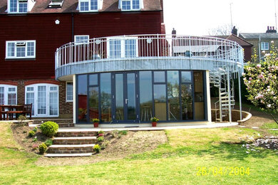 This is an example of a contemporary conservatory in Sussex.