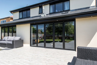 This is an example of a contemporary conservatory in Essex.