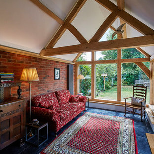 Photo of a medium sized rural conservatory in Berkshire with a standard ceiling and blue floors.